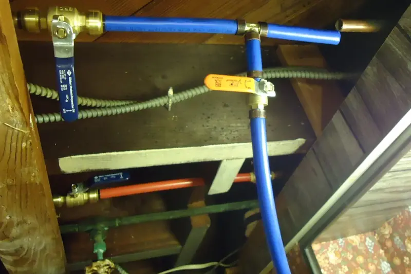 Blue and orange plastic water pipes