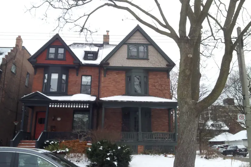 Brick Victorian houses in Toronto with snow on the ground