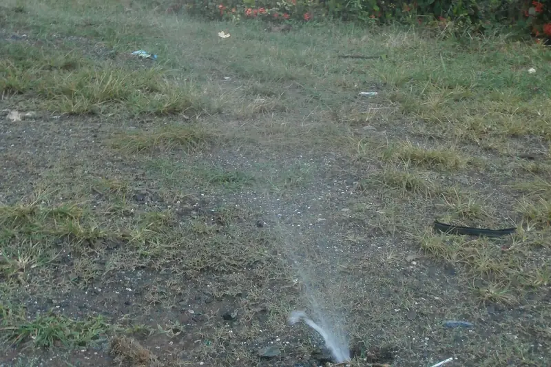 Water spraying from a broken buried line